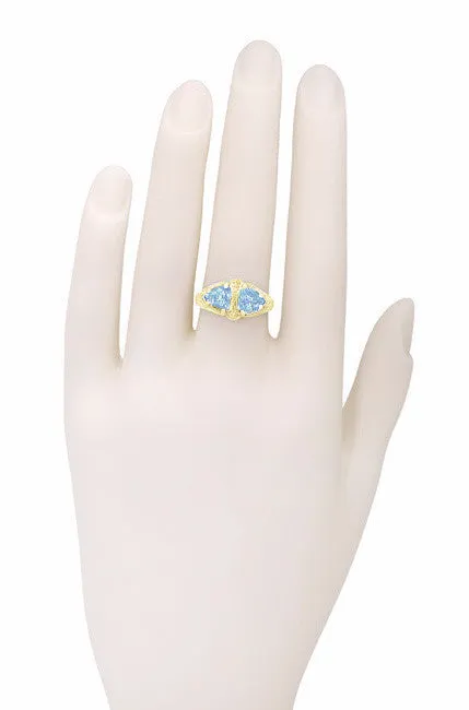 Art Deco Filigree Loving Duo Blue Topaz Ring in 14 Karat Yellow Gold - December Birthstone
