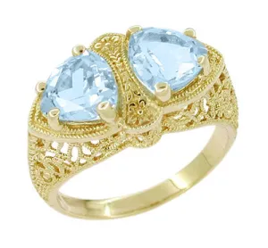 Art Deco Filigree Loving Duo Blue Topaz Ring in 14 Karat Yellow Gold - December Birthstone