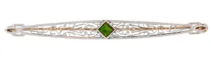 Art Deco Filigree Peridot Bar Brooch in 14 Karat White and Yellow Gold