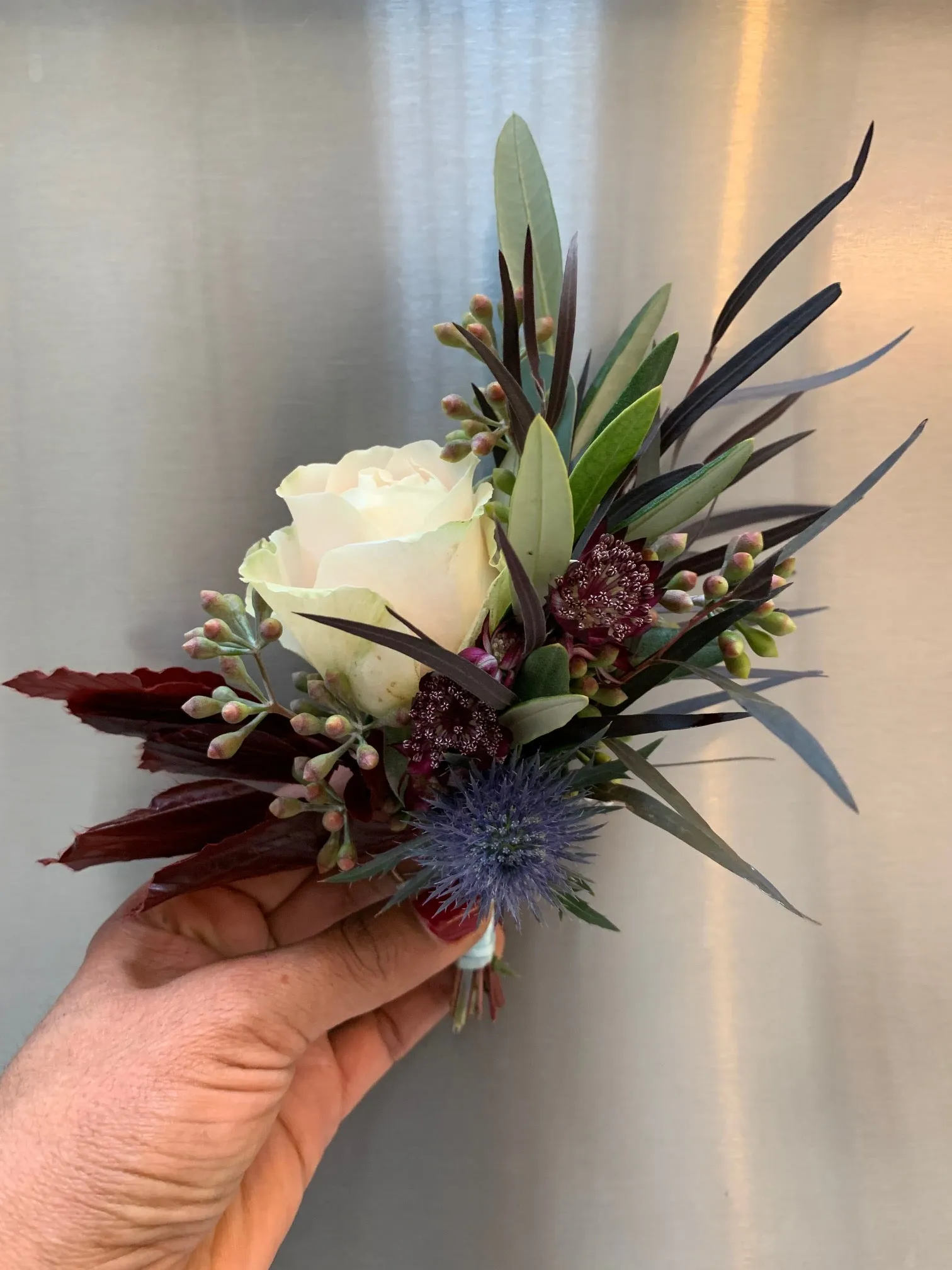 Boutonniere, small event order ($1500 minimum)