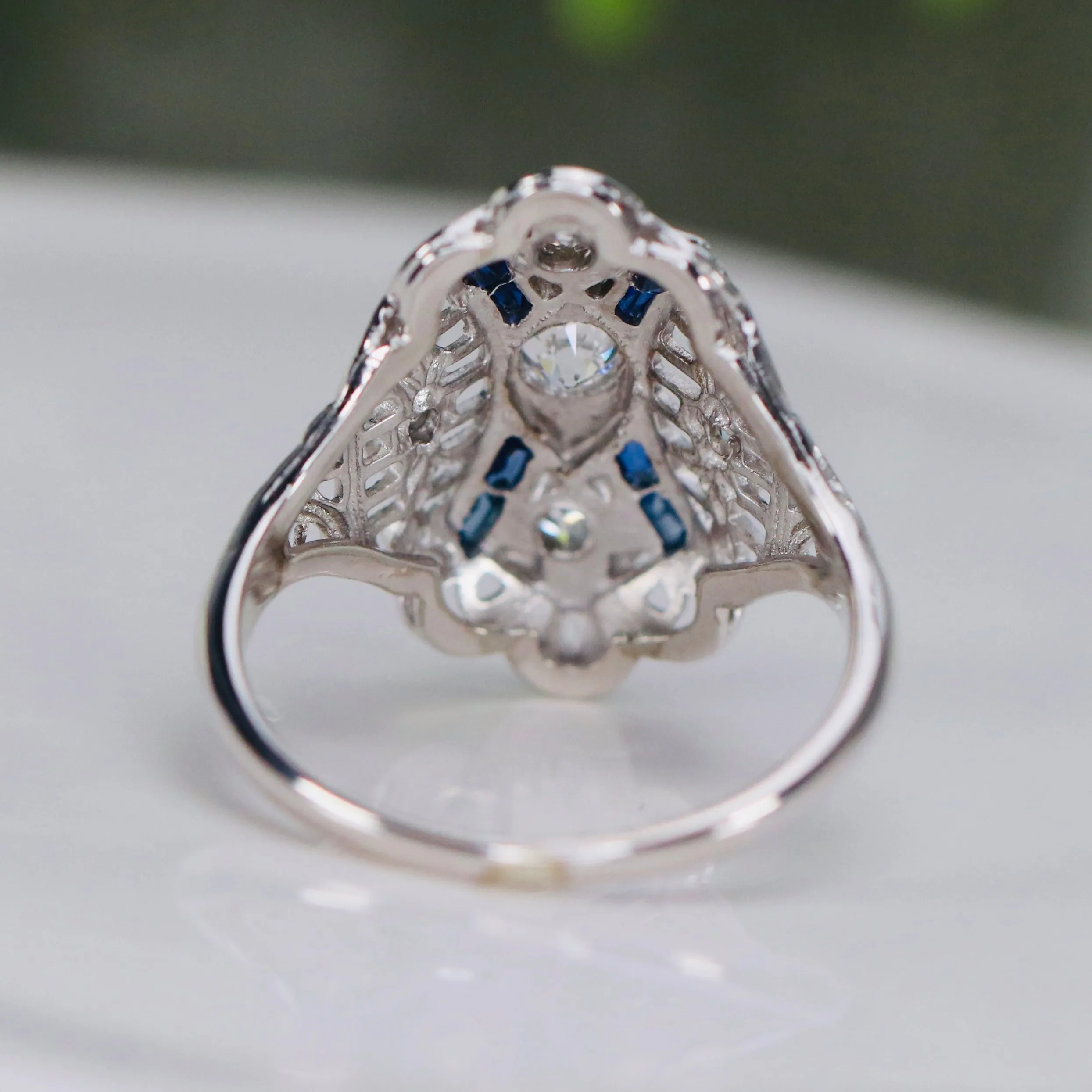 Detailed Vintage OMC diamond and sapphire plaque ring in 14k white gold