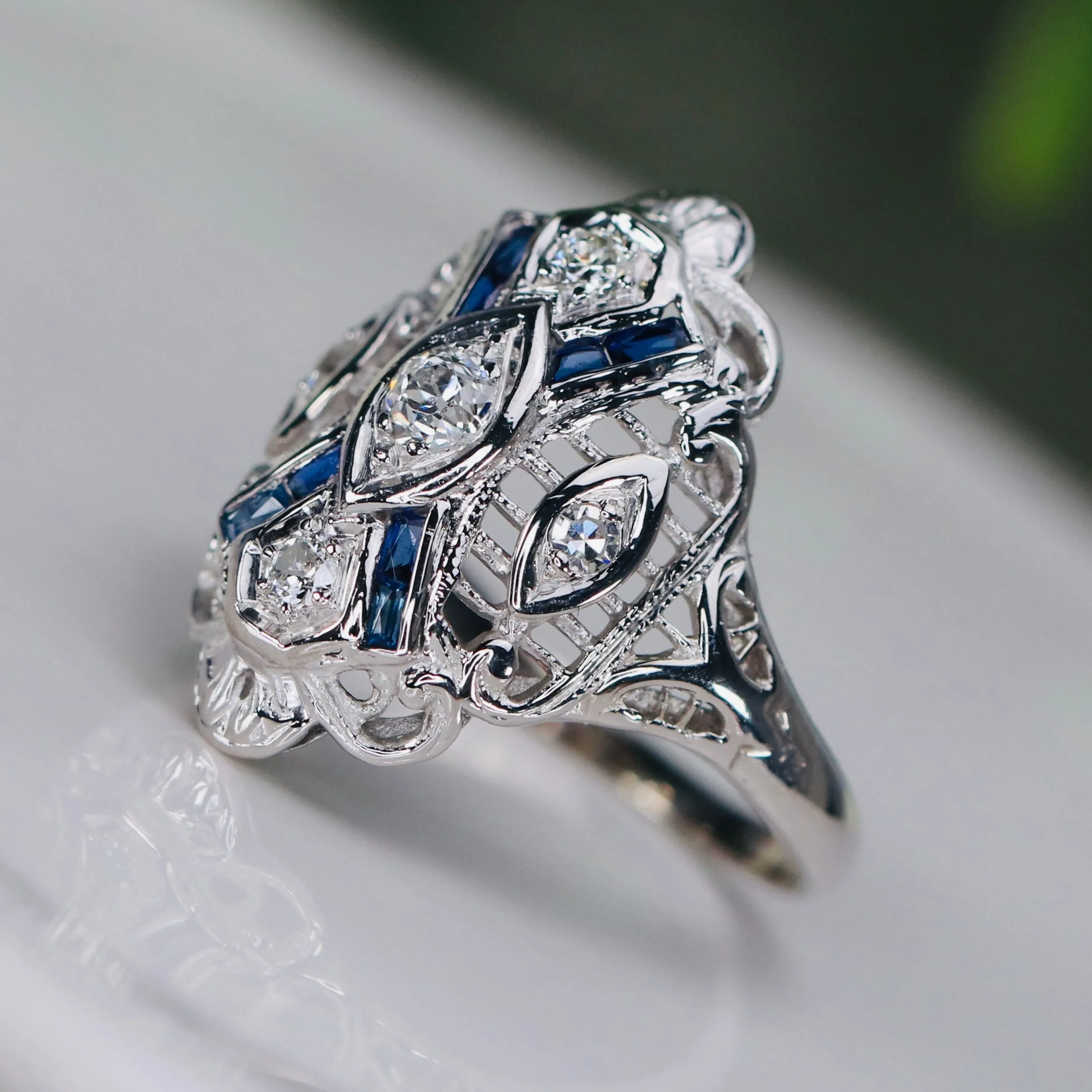 Detailed Vintage OMC diamond and sapphire plaque ring in 14k white gold
