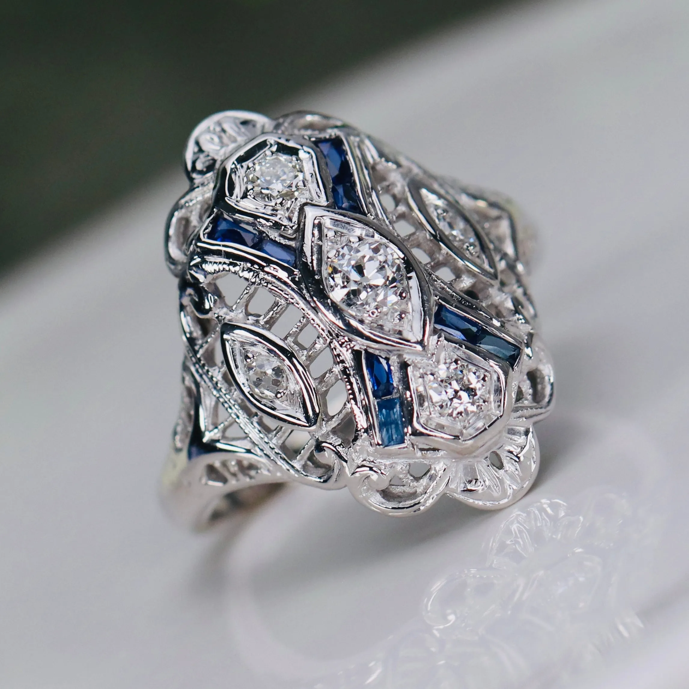 Detailed Vintage OMC diamond and sapphire plaque ring in 14k white gold