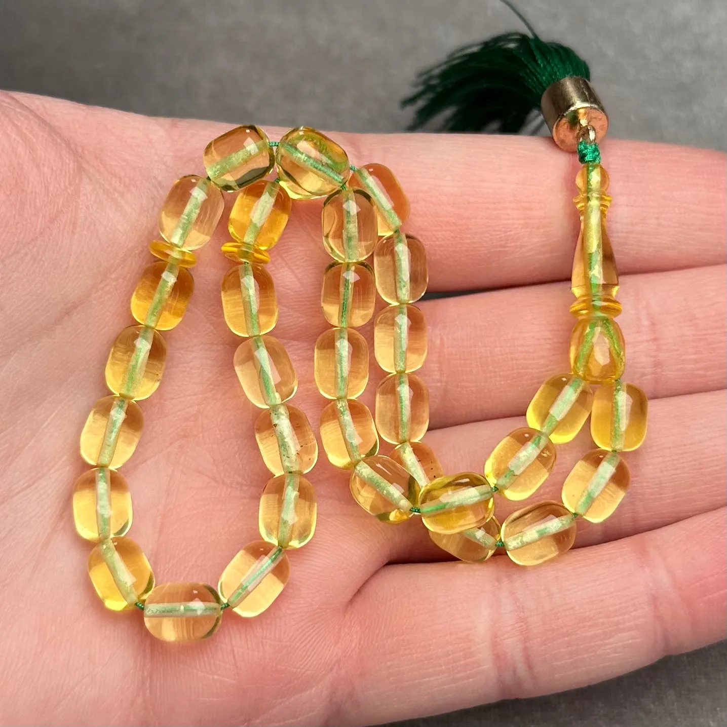 TRANSPARENT AMBER MISBAHA 6,6x8,7mm 10,6g