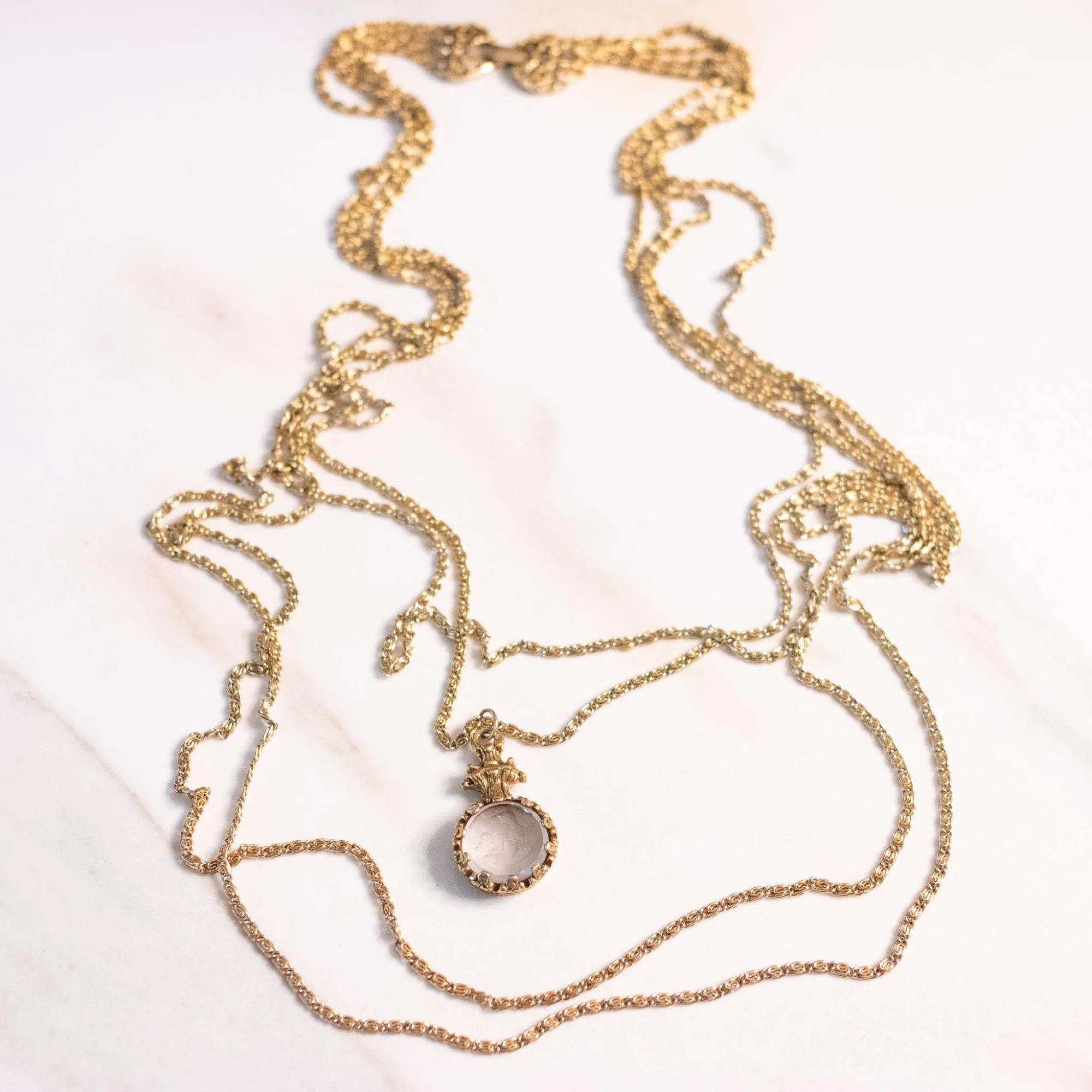 Vintage Goldette Multi Strand Gold Necklace with Etched Crystal Cameo